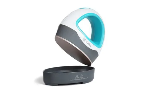LOKLiK Mini Heat Press in LOKLiK blue seen at an angle where it is lifted from the safety base to reveal the ceramic coated heating plate.