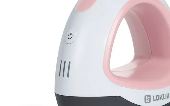 Closer view of the LOKLiK Mini Heat Press in romance pink zoomed on the indicator lights for the 3 preset modes.