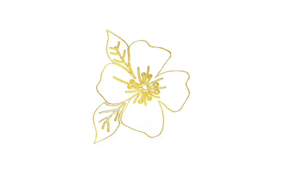 Gold foil design of a flower made with the iCraft™ foil transfer tip