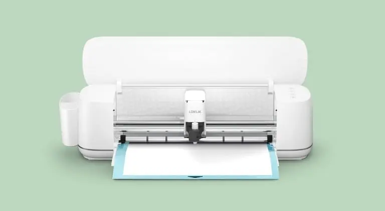 Frontal view of an open LOKLiK iCraft with a blue cutting mat and white heat transfer vinyl.